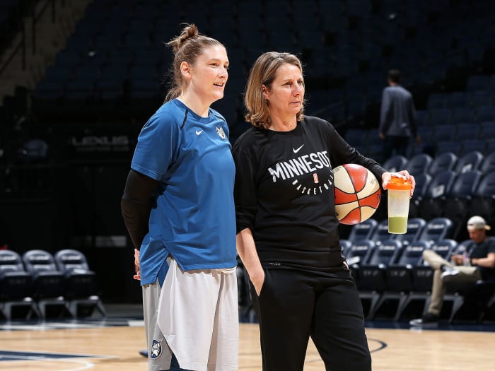 Whalen (left) talks with Minnesota Lynx head coach Cheryl Reeve before an WNBA game in June 2018